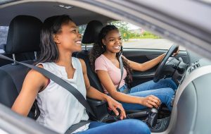 Teen Mother and Daughter Driving