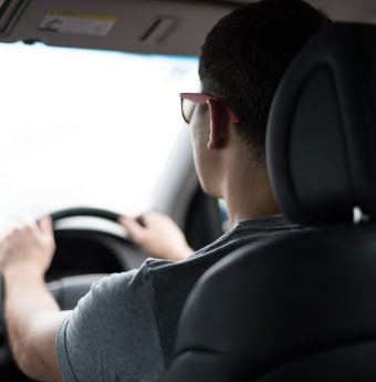 A young driver behind the wheel