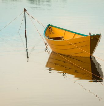 A boat floating in the water
